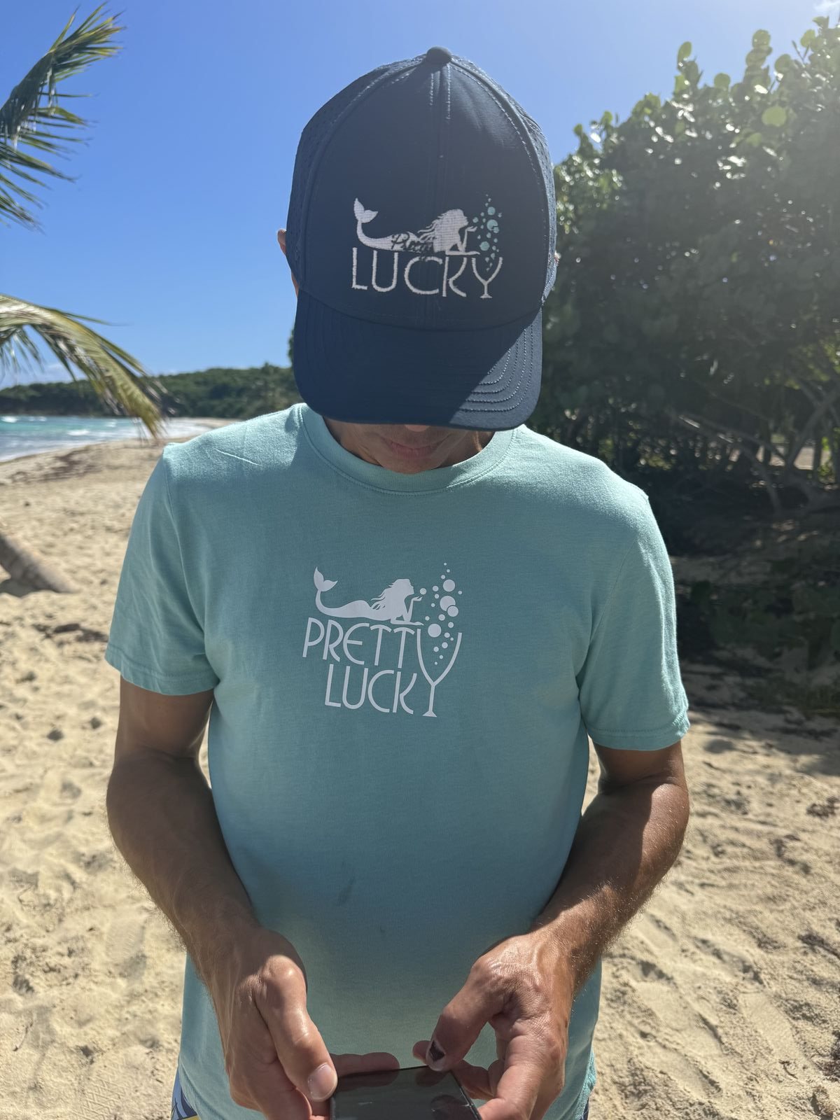 Captain Shaun in Pretty Lucky gear on the beach